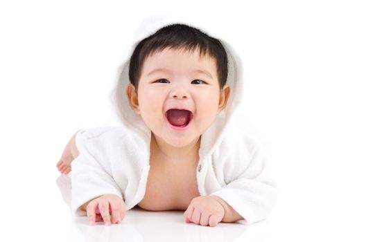 beautiful asian baby girl crawling on the floor