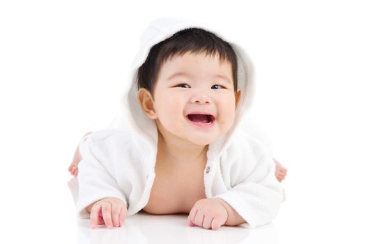 beautiful asian baby girl crawling on the floor