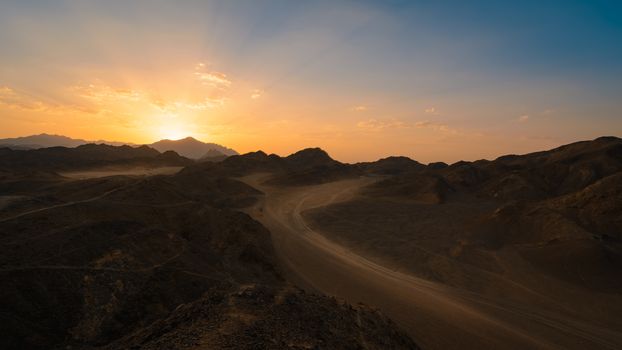 Wonderful landscape,Arabian desert of stone, Egypt with mountains at sunset.