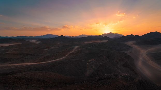 Wonderful landscape,Arabian desert of stone, Egypt with mountains at sunset.