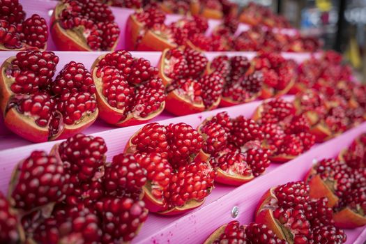 Lots of ripe pomegranate fruit, selected focus