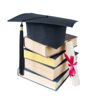 Black graduate hat, stack of big books and paper scroll tied with red ribbon with a bow, isolated on white background