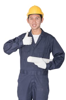 Young worker with yellow helmet holding blueprint isolated over white background