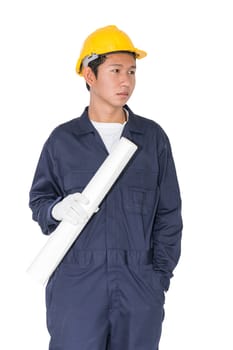 Young worker with yellow helmet holding blueprint isolated over white background