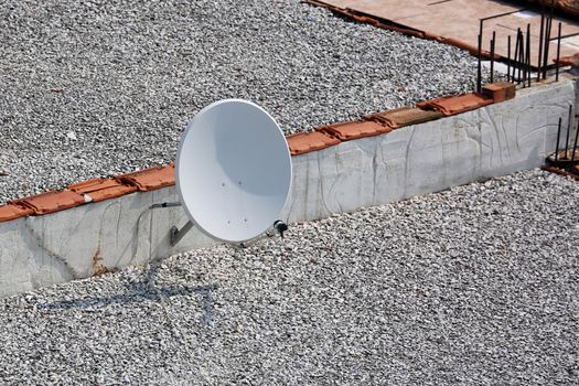 Television Satellite Dish on a Roof House in Greece