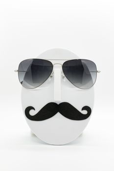 Men's fashion mannequin wearing fashionable sunglasses on white background.