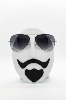 Men's fashion mannequin wearing fashionable sunglasses on white background.