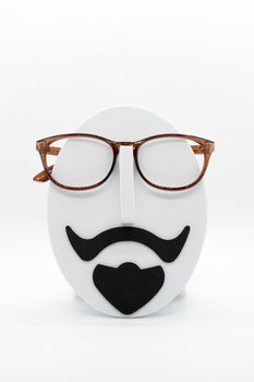 Men's fashion mannequin wearing fashionable spectacles on white background. Glasses