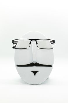 Men's fashion mannequin wearing fashionable spectacles on white background. Glasses