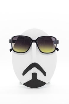 Men's fashion mannequin wearing fashionable sunglasses on white background.