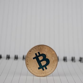Cryptocurrency gold bitcoin coin in notebook