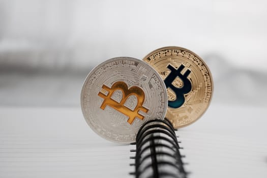 Digital currency silver and gold physical bitcoin coins.