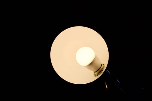 Small white bulb in the darkness room