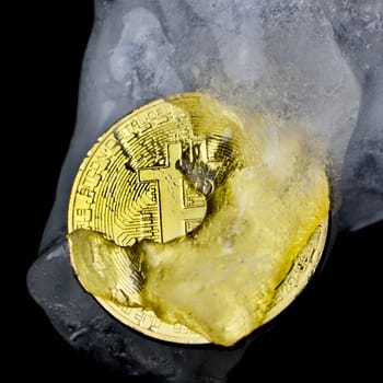 Physical cryptocurrency coin frozen