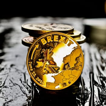 Gold brexit coin. Europe leaving.