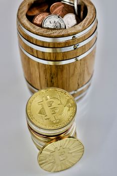 Wooden barrel with money and bitcoin physical coin