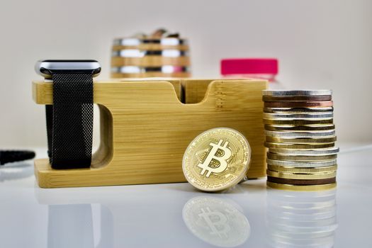 Bitcoin cryptocurrency, watch and office accesories