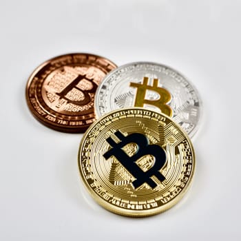 Cryptocurrency physical gold, silver and brass bitcoin coins