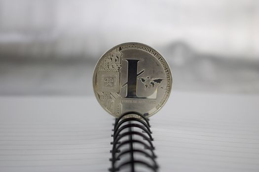 Digital currency physical silver litecoin coin.
