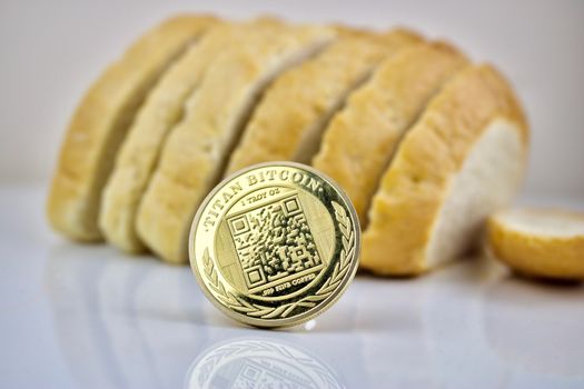 Physical cryptocurrency coin gold titan bitcoin and bread