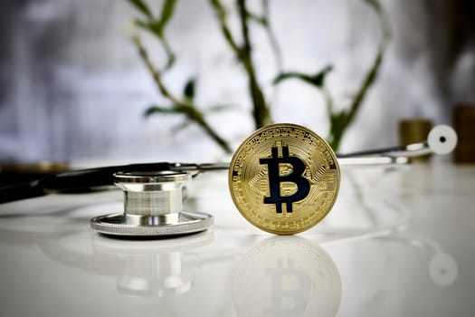 Digital currency physical gold bitcoin in medical concept