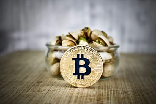 Digital currency physical gold bitcoin coin - nuts concept