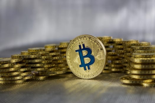 Cryptocurrency physical gold bitcoin coin - gold concept.