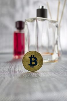 Cryptocurrency physical gold bitcoin coin in perfume spa