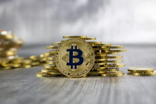 Cryptocurrency physical gold bitcoin coin money concept.