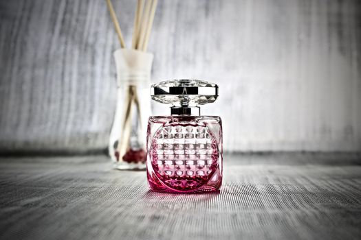 Luxury fragrance in pink square bottle