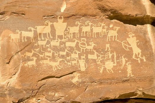 The Hunter's Panel is a petroglyph created by the Freemont Indians and is located in Nine Mile Canyon Utah.  The petrogylph is also referred to as the Cottonwood Panel and The Great Hunt