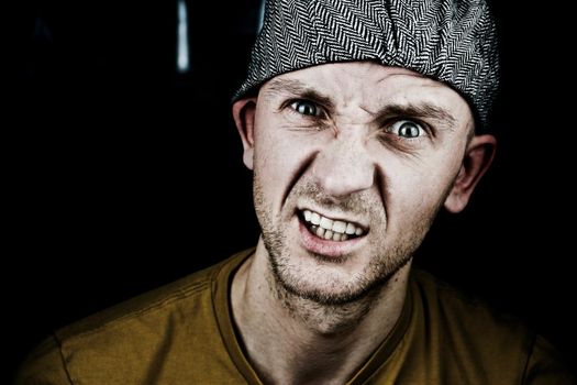 Black scene young man in grey cap