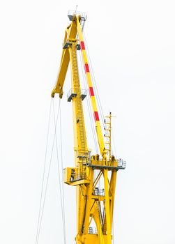 A fragment of a floating crane on the construction of the bridge