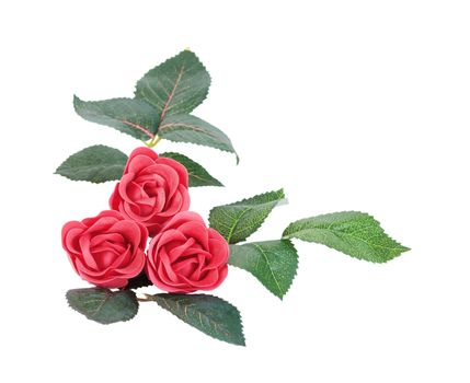 Artificial red roses with leaves made of soap, isolated on white background