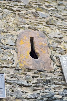 Huge iron lock encrusted in a stone wall of the portico at the castle of Vianden