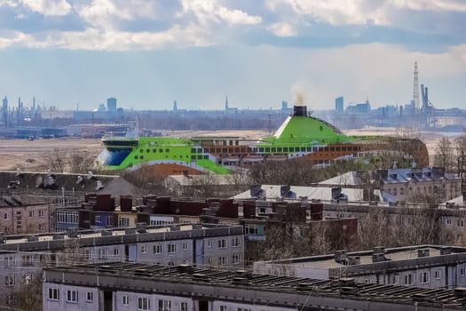 Green cruise liner. Passenger ferry sailing past the Riga city