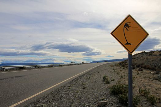 Patagonia high wind road sign yellow, on route 40 near El Chalten, Argentina