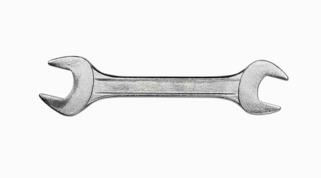 a metal wrench on white background