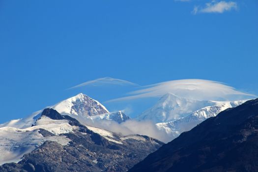 Typical foehn clouds, altocumulus lenticularis lent, in the mountains, Patagonia, Chile