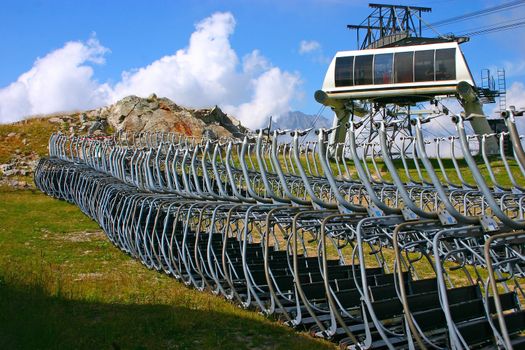 Ski seats without job in the summer in the French Alps