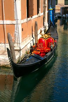 Gondola in the small canals of the romantic Venice