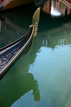Gondola in the small canals of the romantic Venice