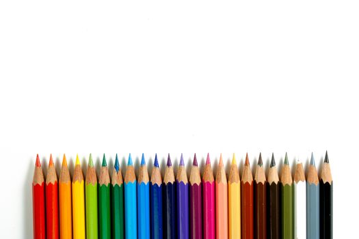 An assortment of color pencils on white background