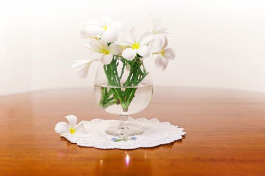 Still life with white spring summer flowers .