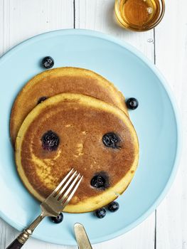 close up of rustic golden blueberry pancake