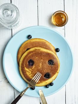 close up of rustic golden blueberry pancake