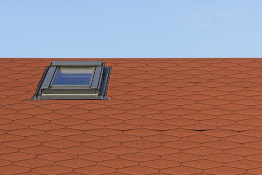 Part of the red roof with sunroof