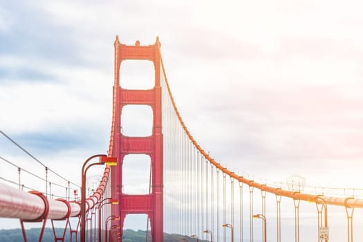 Detail of Golden Gate bridge with pillar and suspension cables