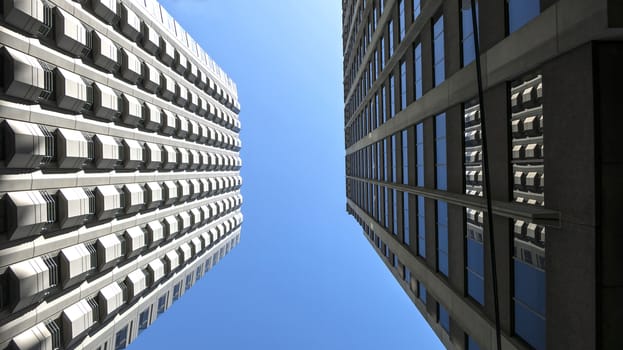 This is an image of two buildings looking up located in San Francisco's financial district.