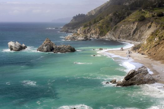 This image was taken at the McWay Falls overlook located near Big Sur. This image is looking North, about 40 miles from Carmel.